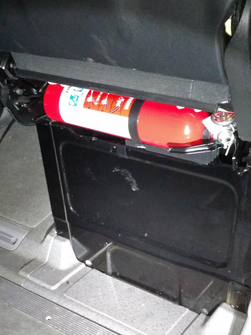 Sprinter Discovery Vanlife Photo Fire Extinguisher with seat pushed all the way back